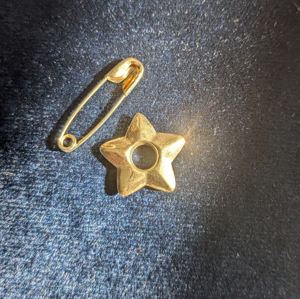 Safety pin and puffy star charm